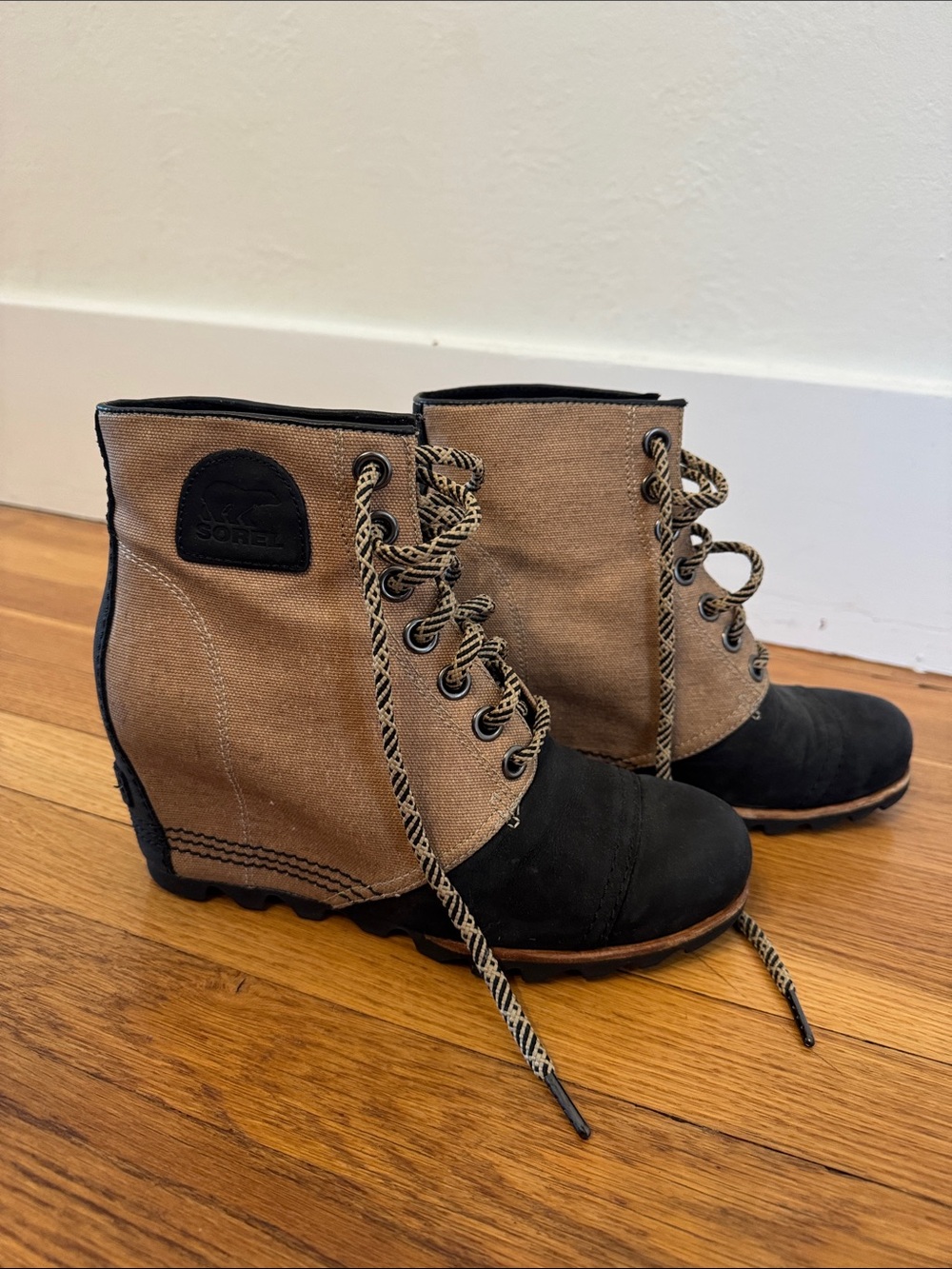Sorel Joan of Arctic wedge boots in black & brown, size US 8.5